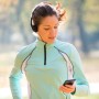 Woman jogging and listening music